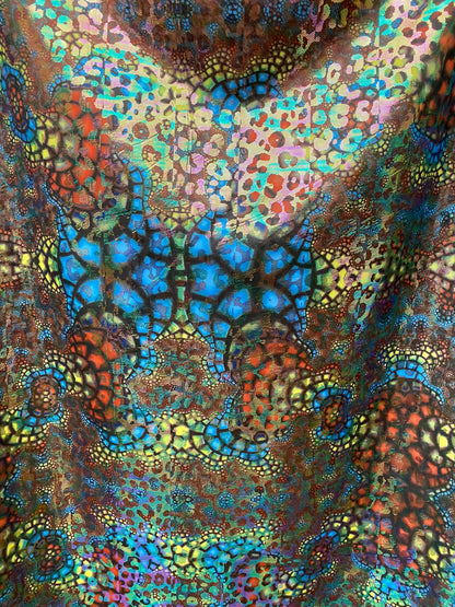 New Exotic Wild animal print design iridescent foil on Nylon spandex 4-way Stretch 58/60” Sold by the YD. Ships worldwide from Los Angeles.