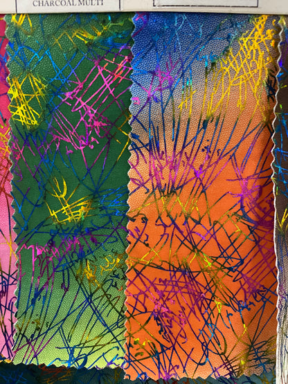 New tie dye Bang bang hologram foil print in nylon spandex 4way stretch 58/60” Sold by the YD. Ships worldwide from Los Angeles CA.