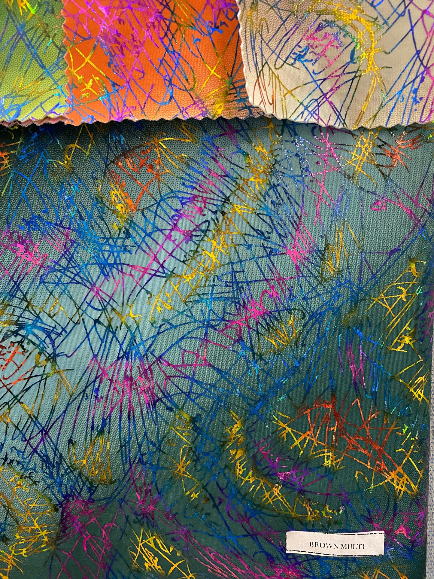 New tie dye Bang bang hologram foil print in nylon spandex 4way stretch 58/60” Sold by the YD. Ships worldwide from Los Angeles CA.