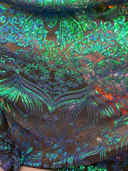 New modern sequins Jennifer design iridescent sequins on stretch mesh 2-way 58/60” Sold by the YD. Ships worldwide from Los Angeles CA USA.
