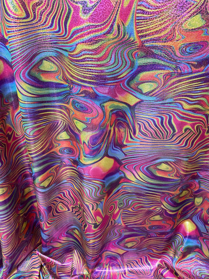 New lava design multicolor print on nylon spandex with foggy foil all over 4-way stretch 58/60” Sold by the YD. Ships worldwide from L.A CA.