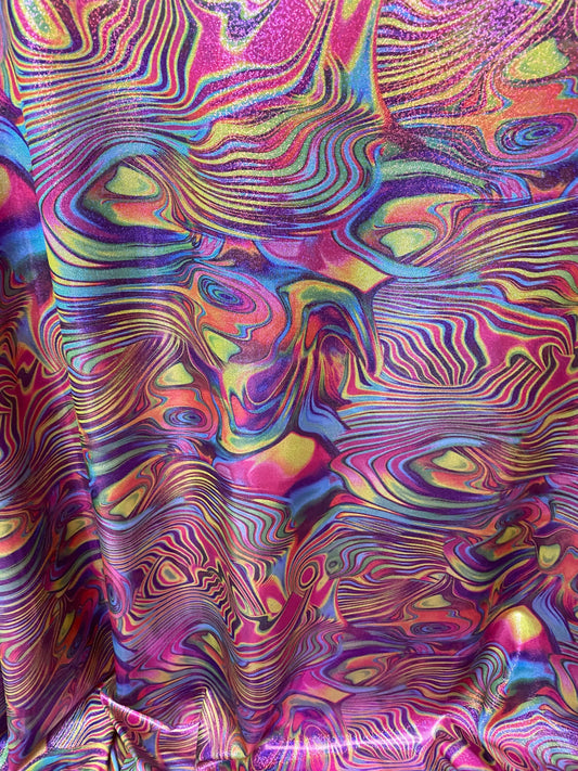New lava design multicolor print on nylon spandex with foggy foil all over 4-way stretch 58/60” Sold by the YD. Ships worldwide from L.A CA.