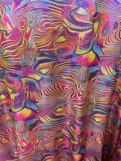 New lava design multicolor print on nylon spandex with foggy foil all over 4-way stretch 58/60” Sold by the YD. Ships worldwide from L.A CA.