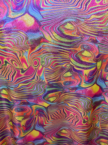 New lava design multicolor print on nylon spandex with foggy foil all over 4-way stretch 58/60” Sold by the YD. Ships worldwide from L.A CA.