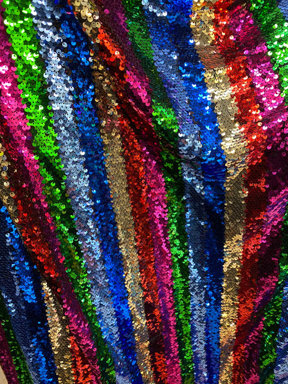 New stripe design rainbow sequins multicolor on stretch mesh 2-way 55/57” Sold by the YD. Ships worldwide from Los Angeles California USA.