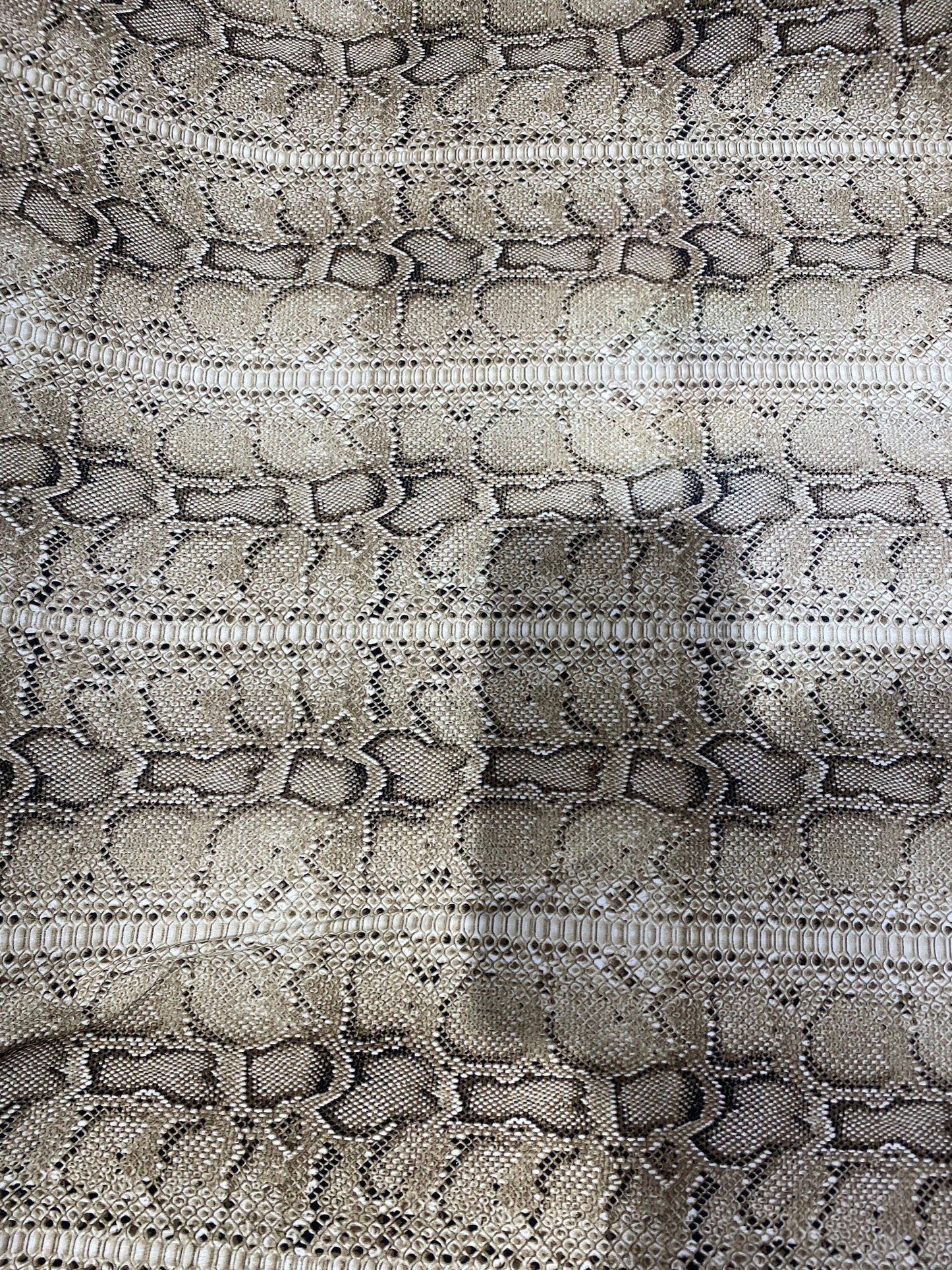 New exotic snake design taupe/black medium weight 4-way stretch 58/60” Sold by the YD. Ships worldwide from Los Angeles California USA.