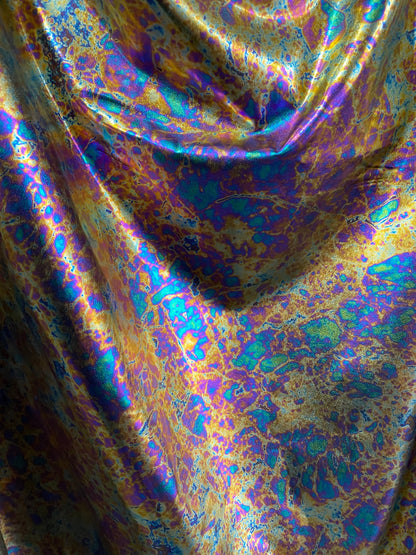 New Modern Lava design oil effect metallic nylon spandex all over foil 4-way 58/60” Sold by the YD. Ships worldwide from Los Angeles CA USA.