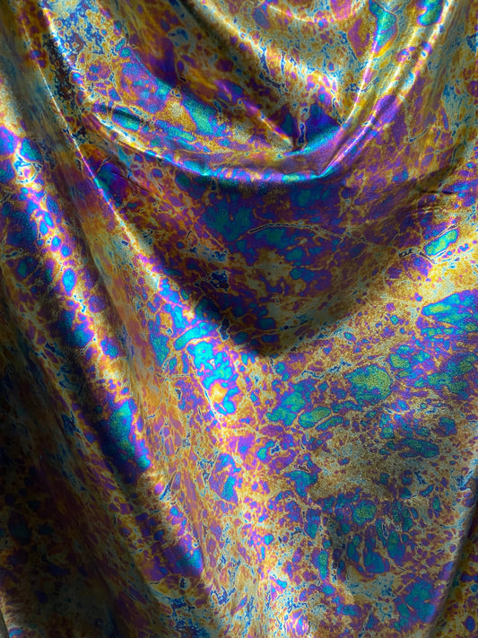 New Modern Lava design oil effect metallic nylon spandex all over foil 4-way 58/60” Sold by the YD. Ships worldwide from Los Angeles CA USA.