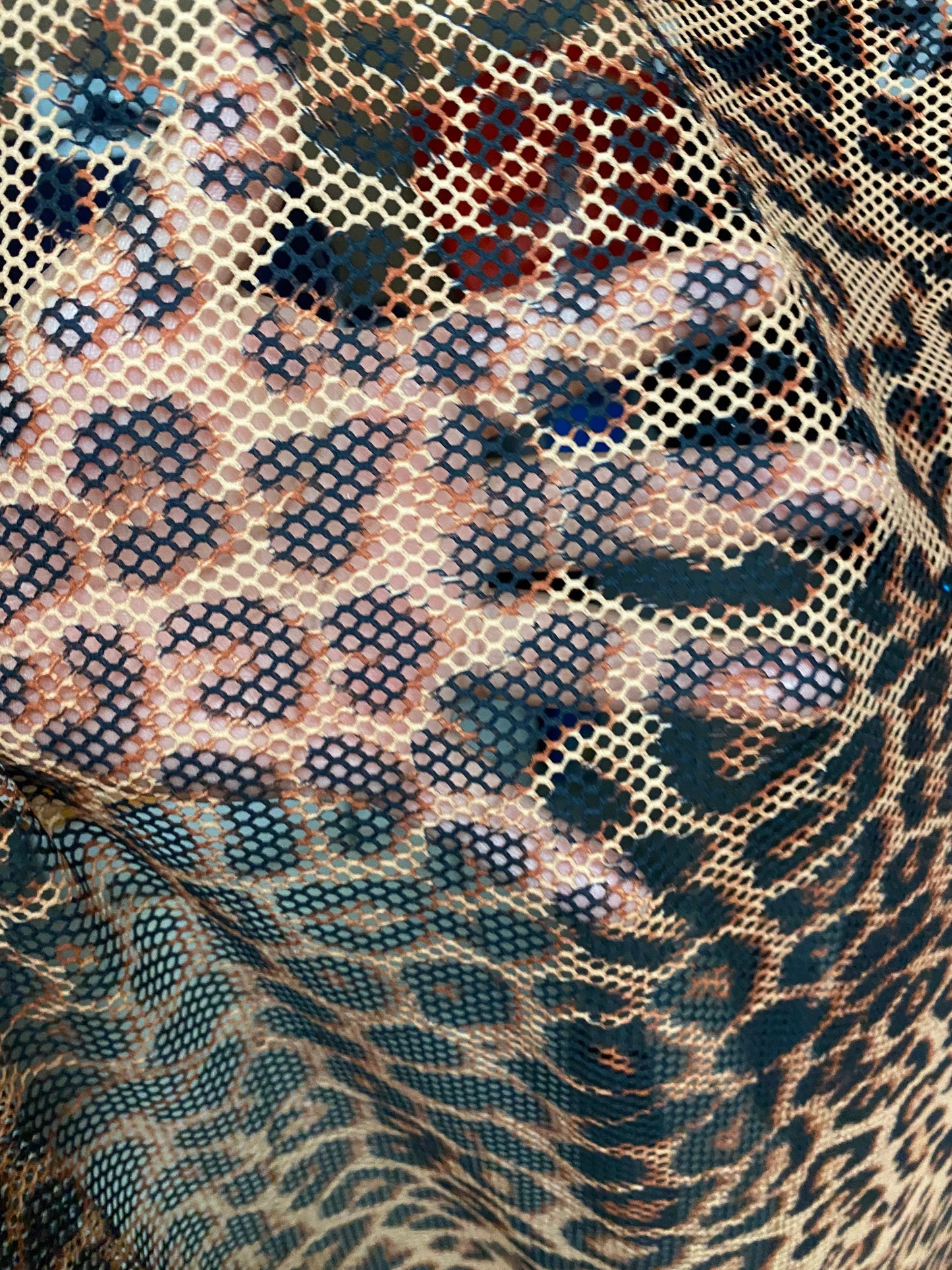 New fishnet exotic leopard design 2-way stretch 58/60” Sold by the YD. Ships worldwide from Los Angeles California USA.