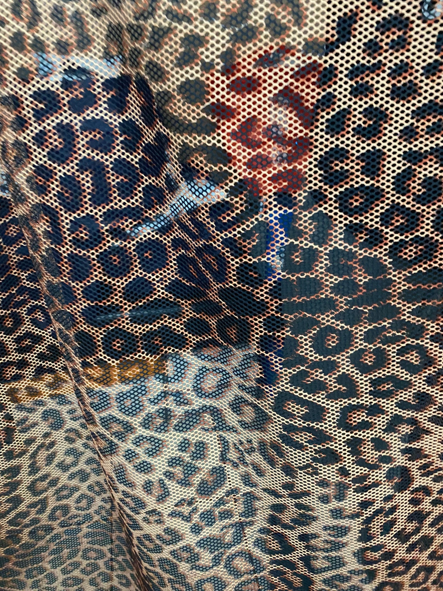 New fishnet exotic leopard design 2-way stretch 58/60” Sold by the YD. Ships worldwide from Los Angeles California USA.