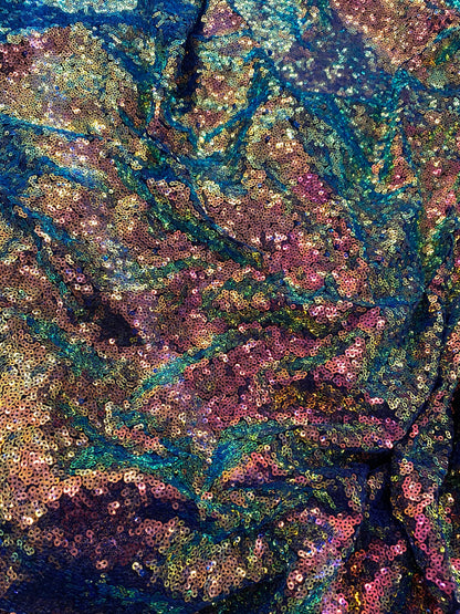 New cosmic iridescent sequins sapphire bronze color on stretch mesh 2-way stretch 58/60” Sold by the YD. Ships worldwide from Los Angeles CA