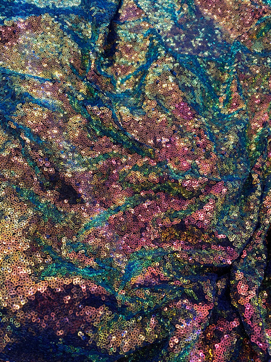 New cosmic iridescent sequins sapphire bronze color on stretch mesh 2-way stretch 58/60” Sold by the YD. Ships worldwide from Los Angeles CA