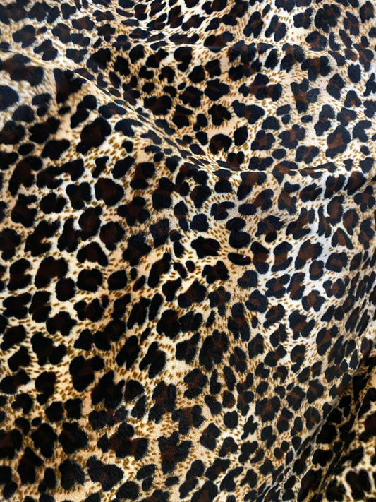 Luxury velvet leopard design natural brown color heavy 4way stretch velvet 58/60” Sold by the YD. Ships worldwide from Los Angeles CA