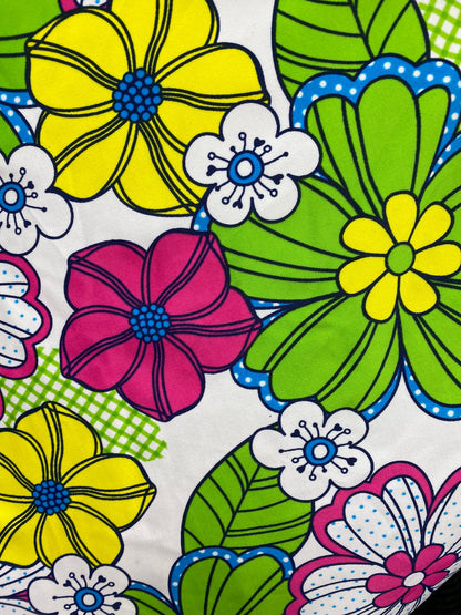 New Spring flower design white/multicolor print nylon spandex 4/way stretch 58/60” Sold by the YD. Ships worldwide from Los Angeles CA USA.