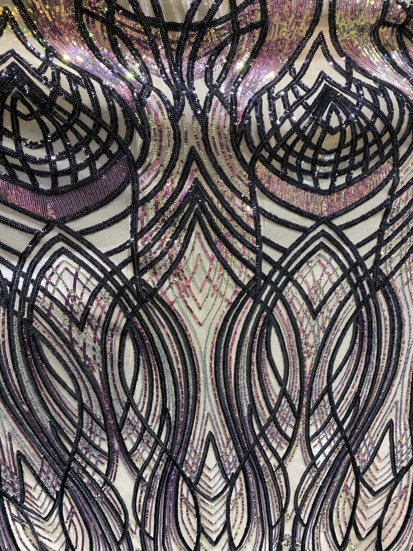 New Modern Beyonce design power mesh with Iridescent sequins 2-way stretch 55/57” Sold by the YD. Ships worldwide from Los Angeles CA USA.