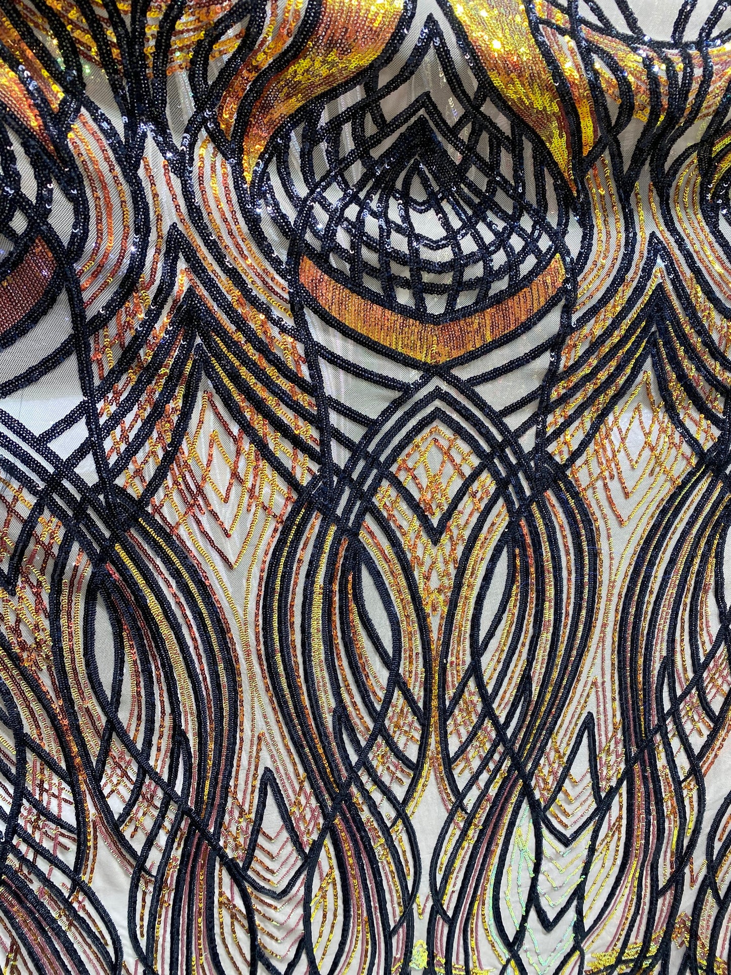 New Modern Beyonce design power mesh with Iridescent sequins 2-way stretch 55/57” Sold by the YD. Ships worldwide from Los Angeles CA USA.