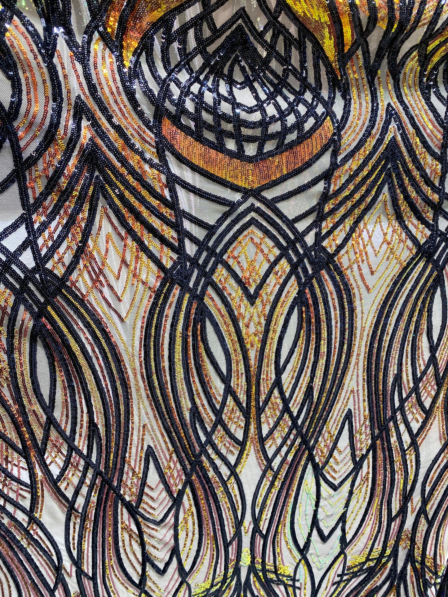 New Modern Beyonce design power mesh with Iridescent sequins 2-way stretch 55/57” Sold by the YD. Ships worldwide from Los Angeles CA USA.