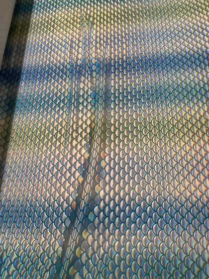 New Rainbow mermaid design blue/silver iridescent metallic nylon spandex 4-way stretch 58/60” Sold by the YD. Ships worldwide from L.A CA.