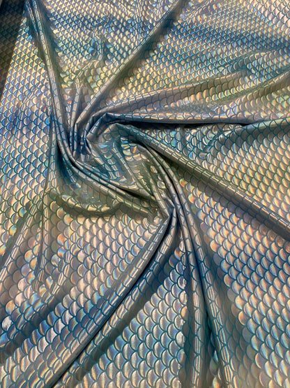 New Rainbow mermaid design blue/silver iridescent metallic nylon spandex 4-way stretch 58/60” Sold by the YD. Ships worldwide from L.A CA.