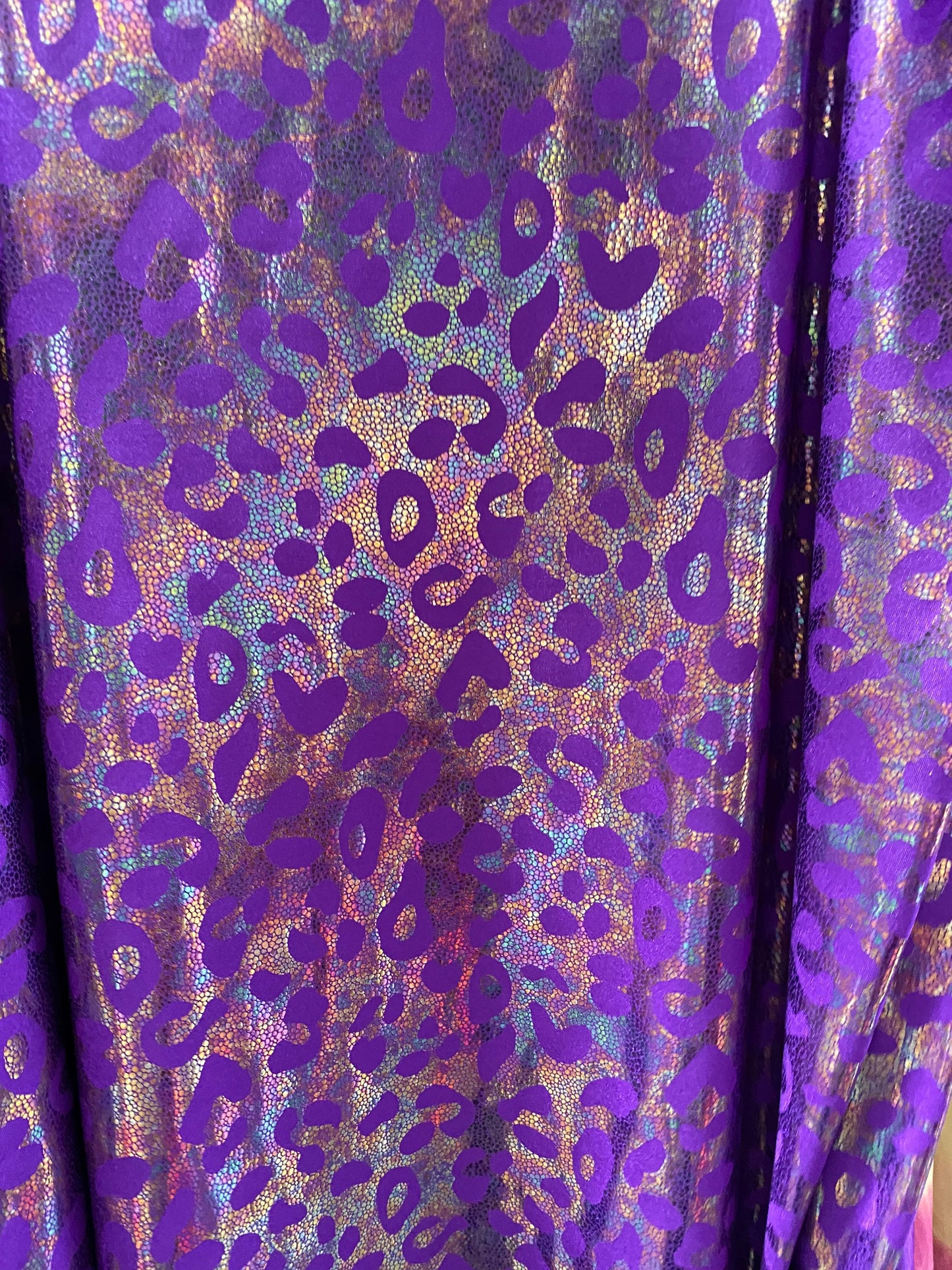 New exotic iridescent leopard design hologram nylon spandex 4-way stretch 58/60” Sold by the YD. Ships worldwide from Los Ángeles California