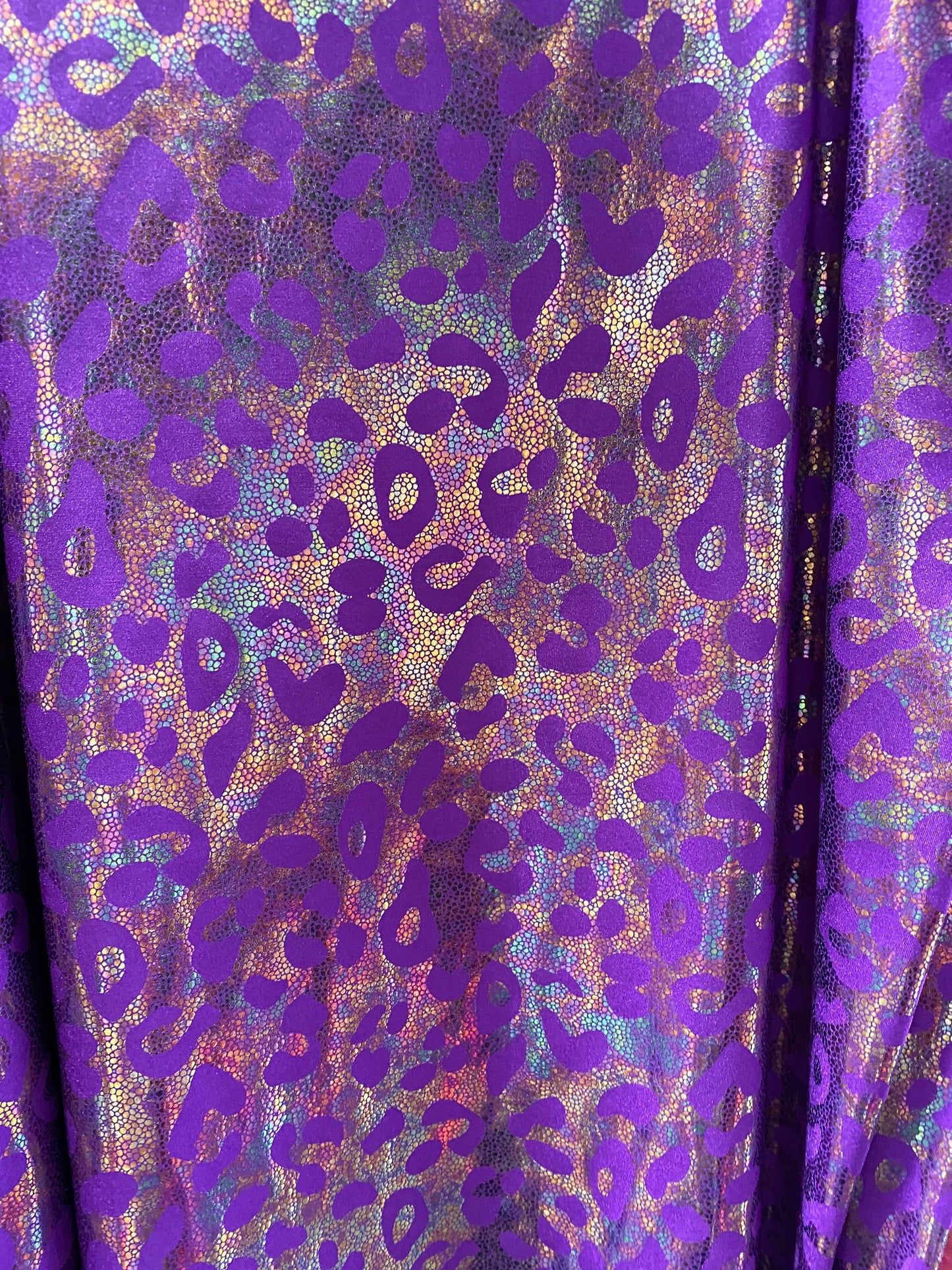 New exotic iridescent leopard design hologram nylon spandex 4-way stretch 58/60” Sold by the YD. Ships worldwide from Los Ángeles California