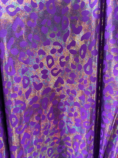 New exotic iridescent leopard design hologram nylon spandex 4-way stretch 58/60” Sold by the YD. Ships worldwide from Los Ángeles California