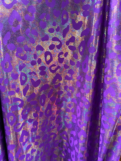 New exotic iridescent leopard design hologram nylon spandex 4-way stretch 58/60” Sold by the YD. Ships worldwide from Los Ángeles California