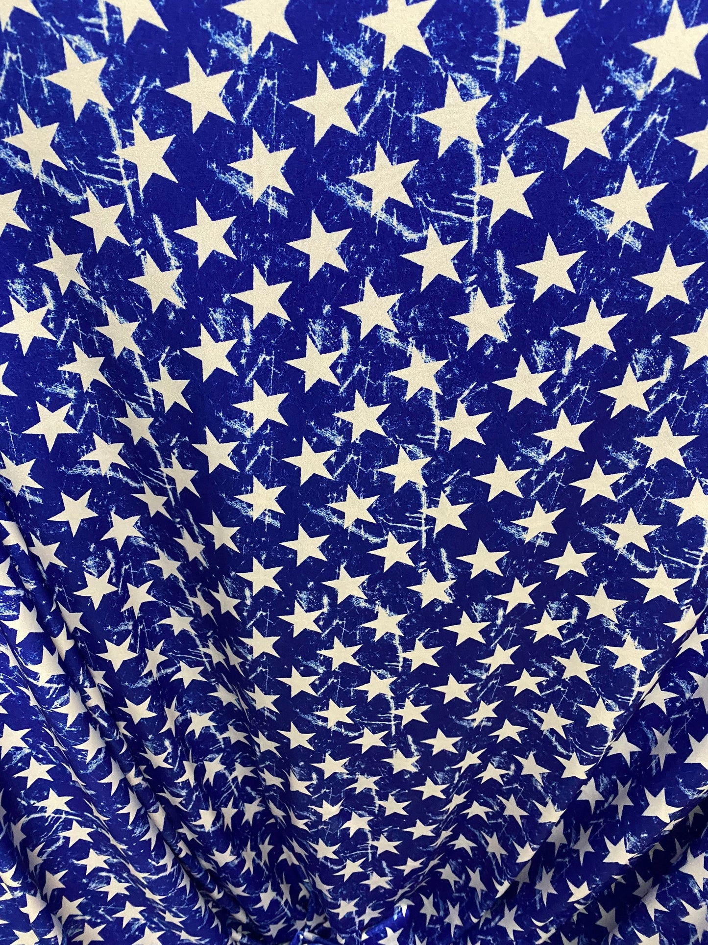 New stars design print on nylon spandex 4-way stretch 58/60” Sold by the YD. Ships worldwide from Los Angeles California USA.