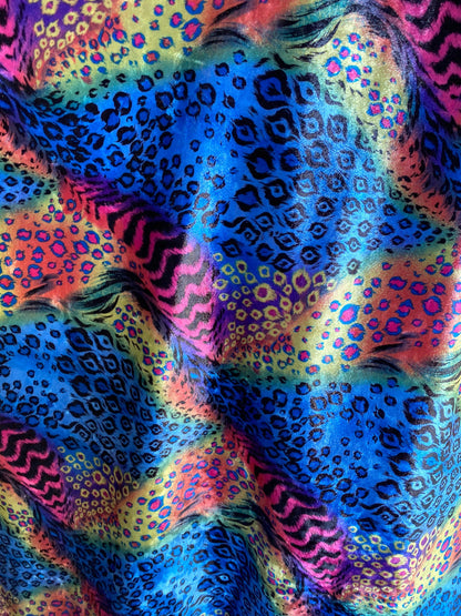 New Exotic multi animal print design multicolor print on stretch velvet 4way 58/60” Sold by the YD. Ships worldwide from Los Angeles CA USA.