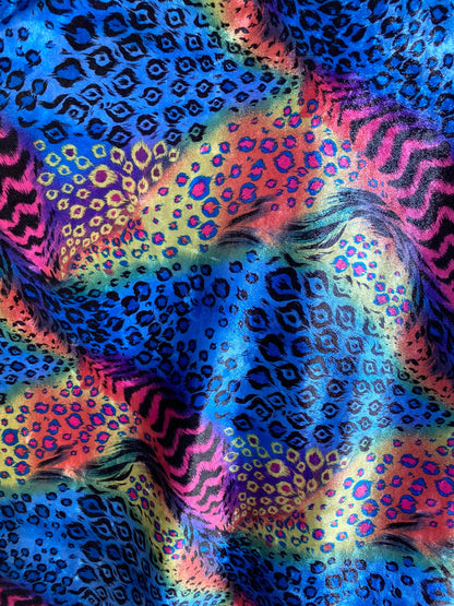 New Exotic multi animal print design multicolor print on stretch velvet 4way 58/60” Sold by the YD. Ships worldwide from Los Angeles CA USA.