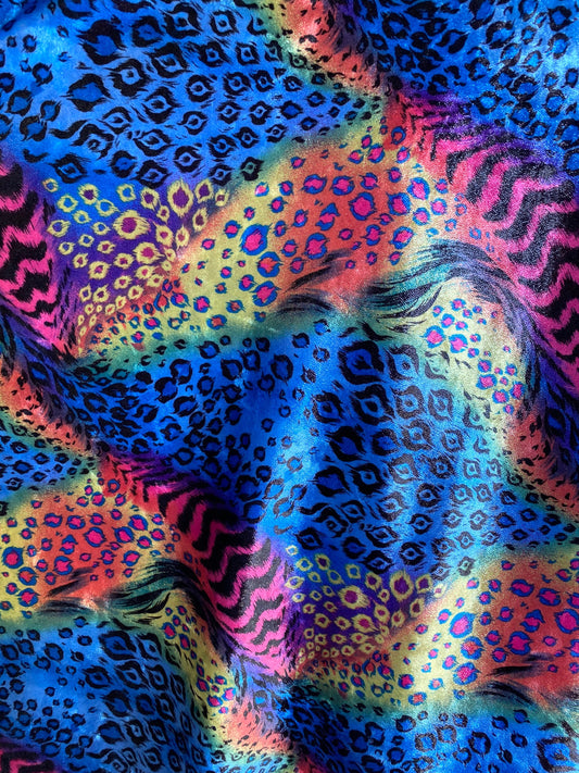 New Exotic multi animal print design multicolor print on stretch velvet 4way 58/60” Sold by the YD. Ships worldwide from Los Angeles CA USA.