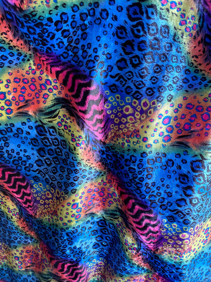 New Exotic multi animal print design multicolor print on stretch velvet 4way 58/60” Sold by the YD. Ships worldwide from Los Angeles CA USA.