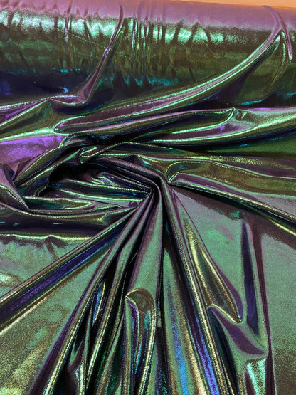 New oil slick iridescent blue green hologram metallic nylon spandex  4-way stretch 58/60” Sold by the YD. Ships worldwide from L.A