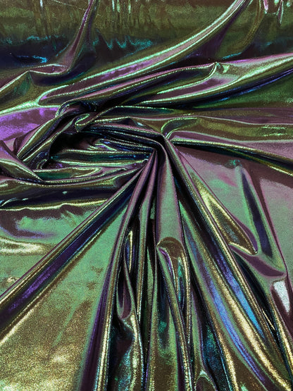New oil slick iridescent blue green hologram metallic nylon spandex  4-way stretch 58/60” Sold by the YD. Ships worldwide from L.A
