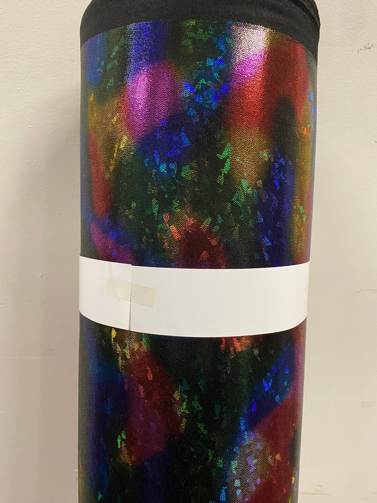 New shattered glass multicolor metallic hologram nylon spandex 4-way stretch 58/60” Sold by the YD. Ships worldwide from Los Angeles CA USA.