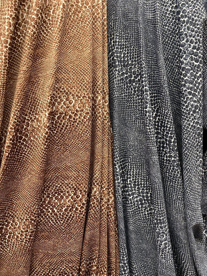 New exotic snake design print on nylon spandex 4-way stretch 58/60” Sold by the YD. Ships worldwide from Los Angeles California USA.