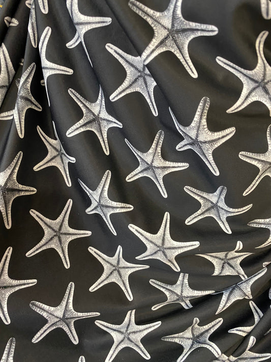 New starfish design print on nylon spandex 4-way stretch 58/60” Sold by the YD. Ships worldwide from Los Angeles California USA.