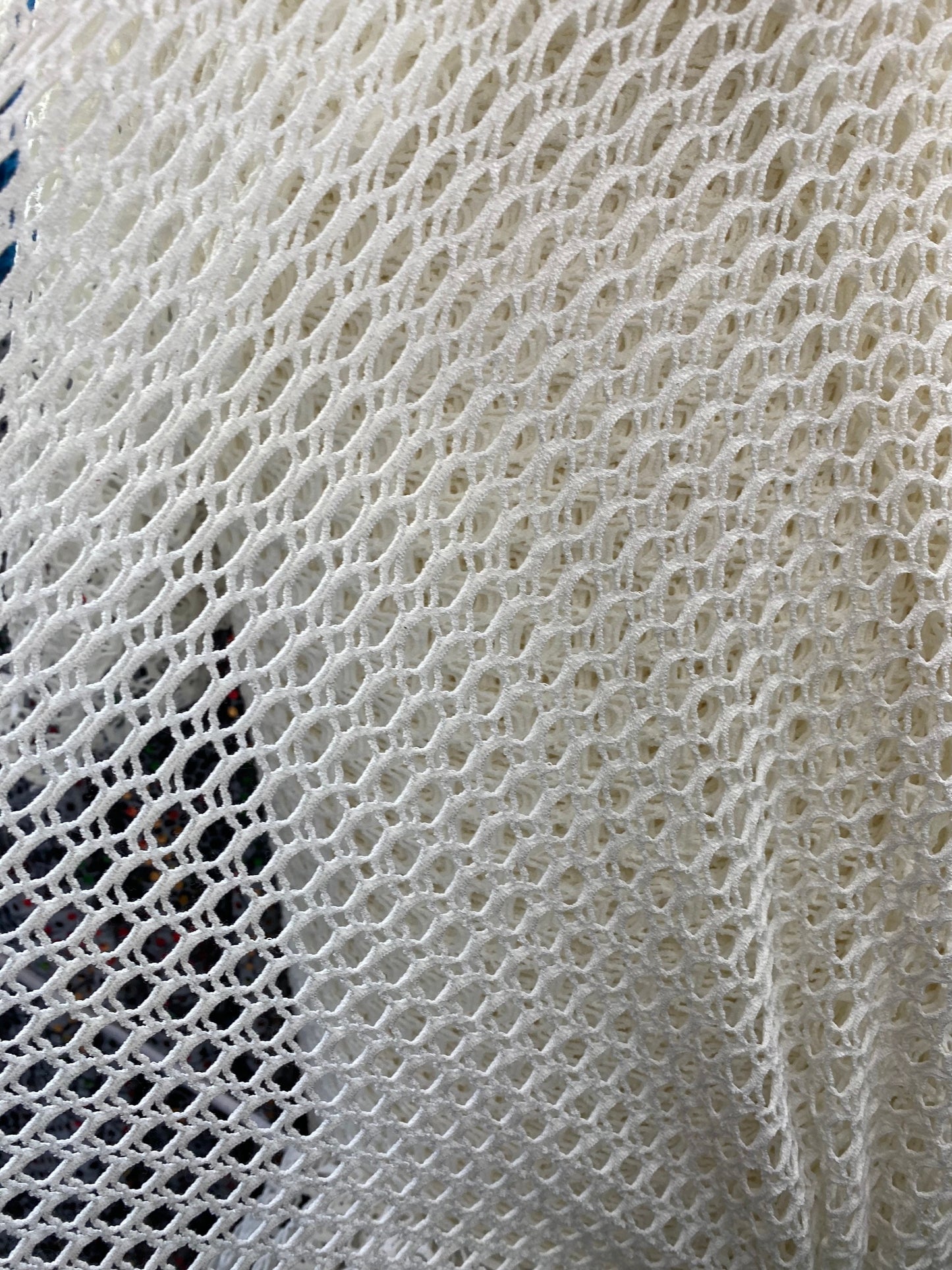 New 3D fishnet off white 2-way stretch 58/60” Sold by the YD. Ships worldwide from Los Angeles California USA.