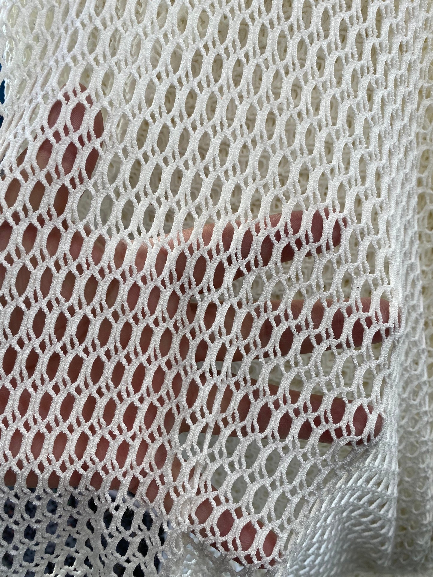 New 3D fishnet off white 2-way stretch 58/60” Sold by the YD. Ships worldwide from Los Angeles California USA.