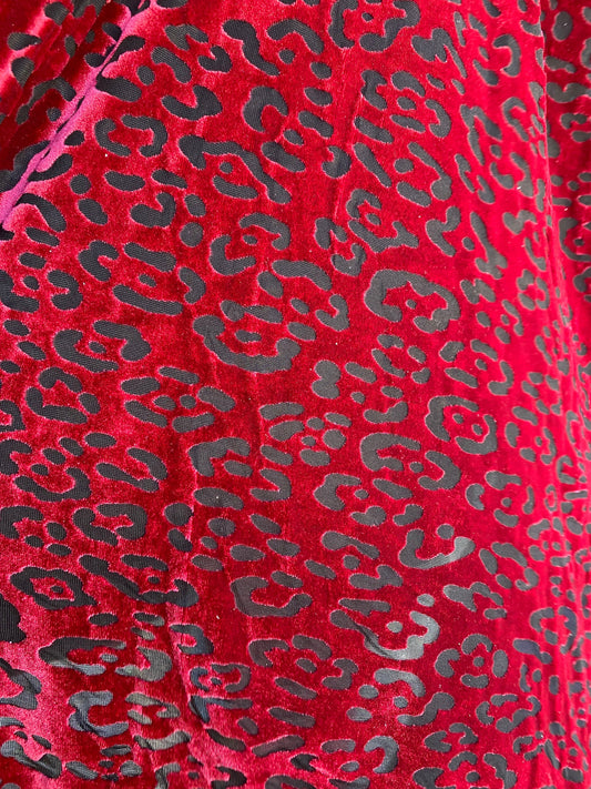 New burnout velvet leopard design black/DK red 4-way stretch 58/60” Sold by the YD. Ships worldwide from Los Angeles California USA.