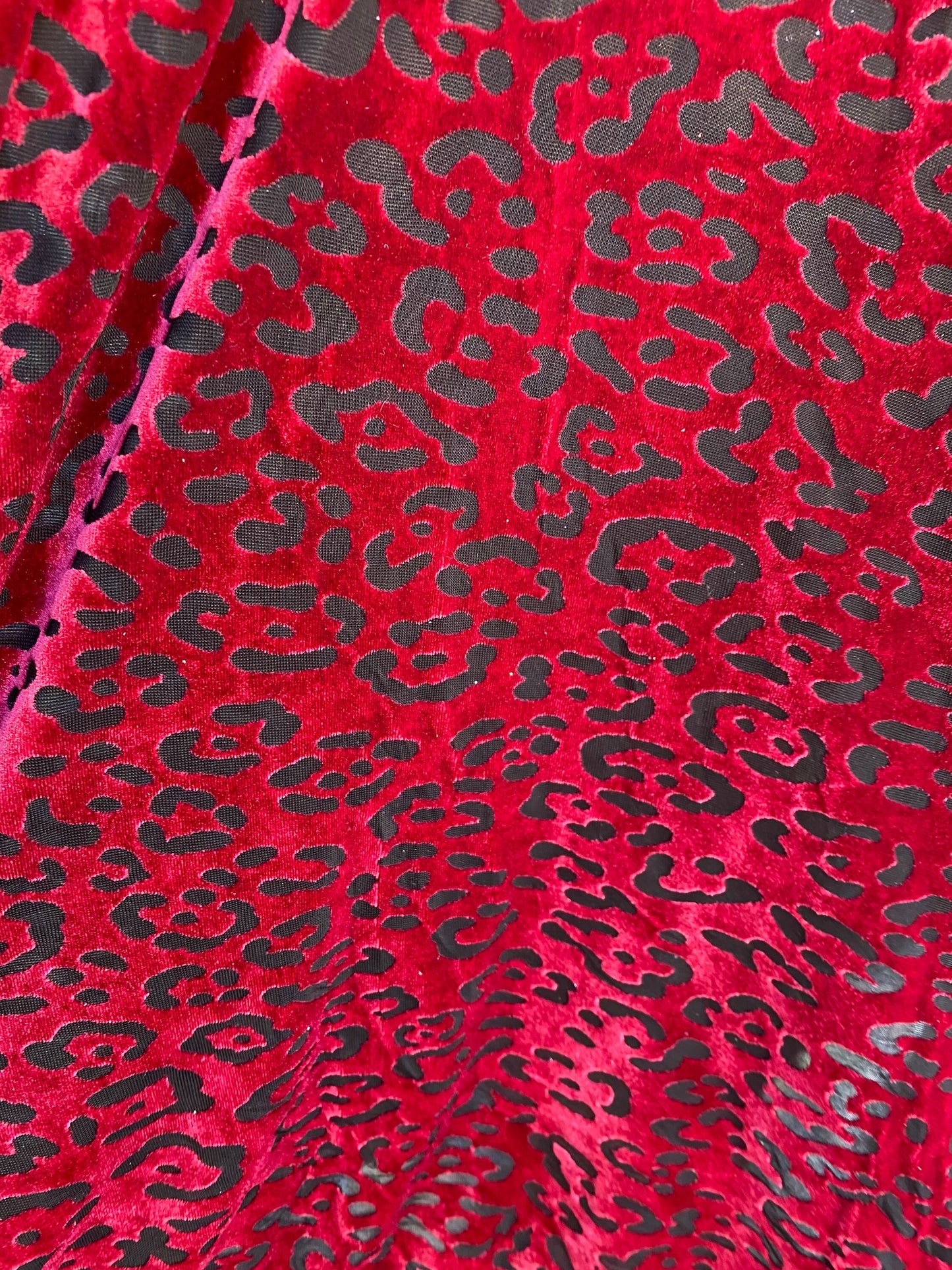 New burnout velvet leopard design black/DK red 4-way stretch 58/60” Sold by the YD. Ships worldwide from Los Angeles California USA.