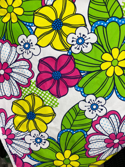 New Spring flower design white/multicolor print nylon spandex 4/way stretch 58/60” Sold by the YD. Ships worldwide from Los Angeles CA USA.