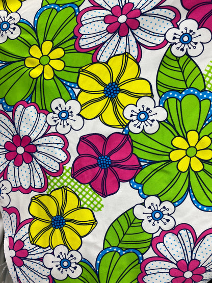 New Spring flower design white/multicolor print nylon spandex 4/way stretch 58/60” Sold by the YD. Ships worldwide from Los Angeles CA USA.