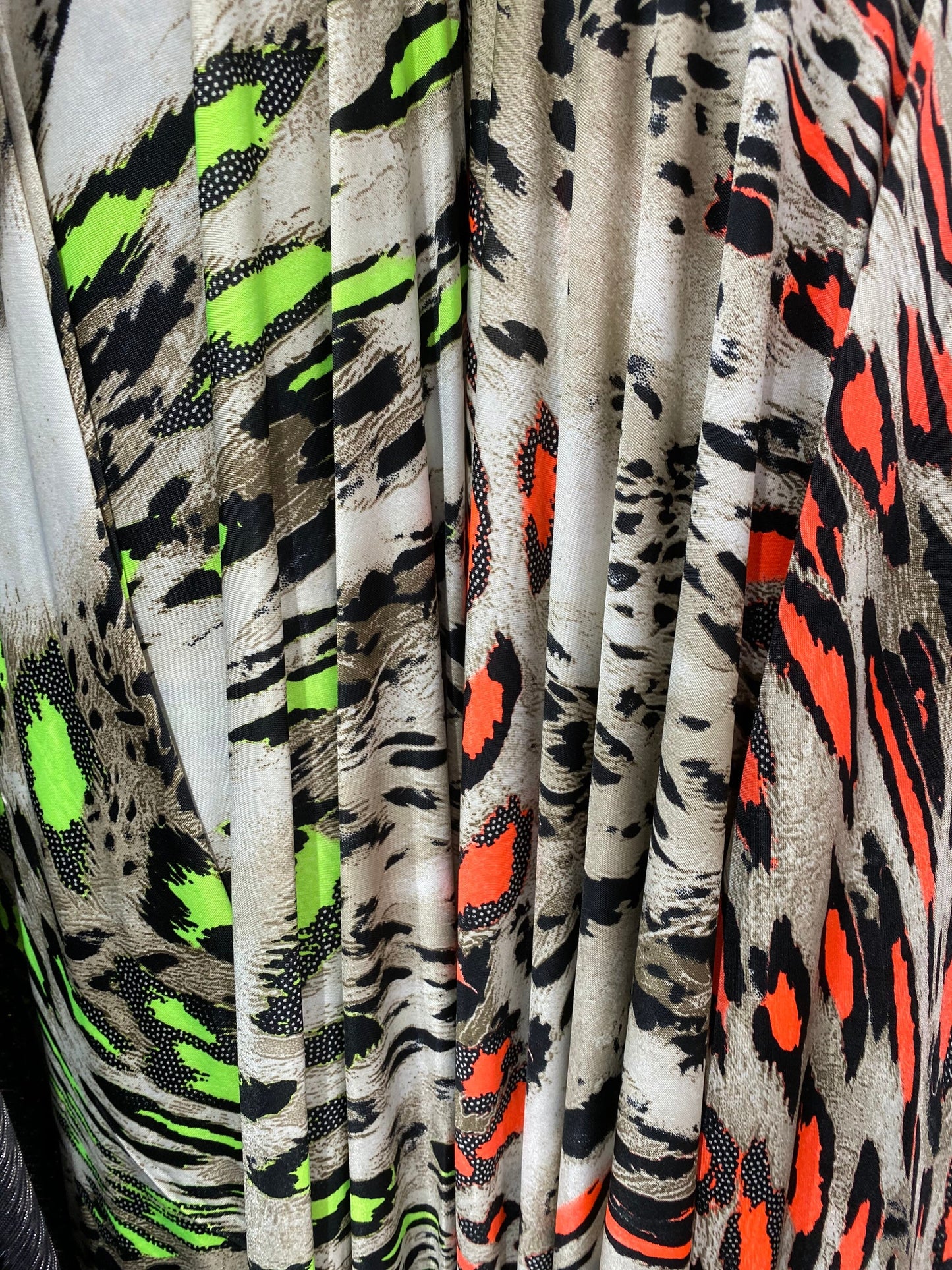 Animal print design great quality medium weight poly spandex 4-way stretch 58/60” Sold by the YD. Ships worldwide from Los Angeles CA USA.