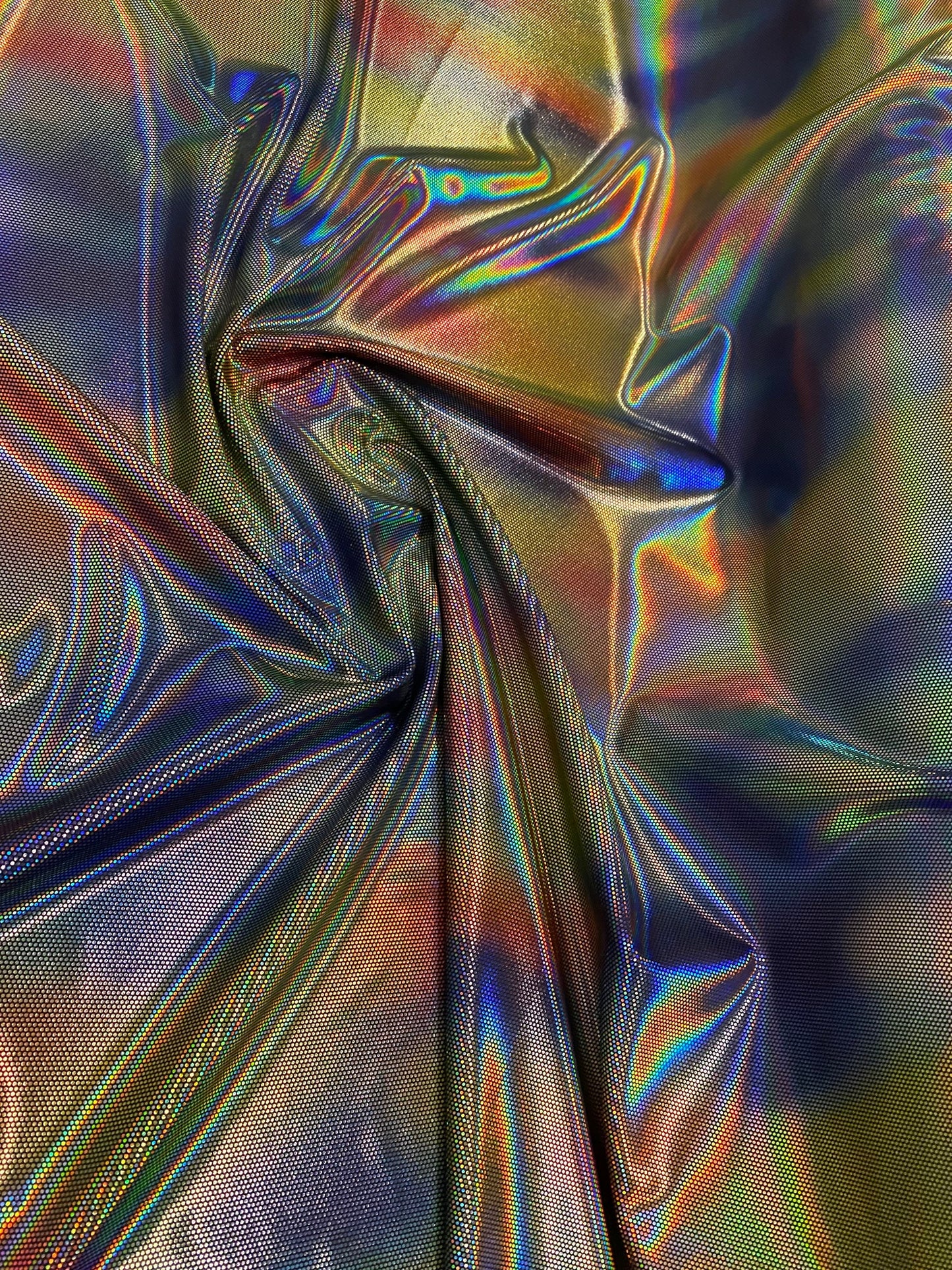 Luxury Spectrum iridescent hologram metallic foil on stretch velvet 58/60” 4-way stretch 58/60” Sold by the YD. Ships worldwide from L.A CA.
