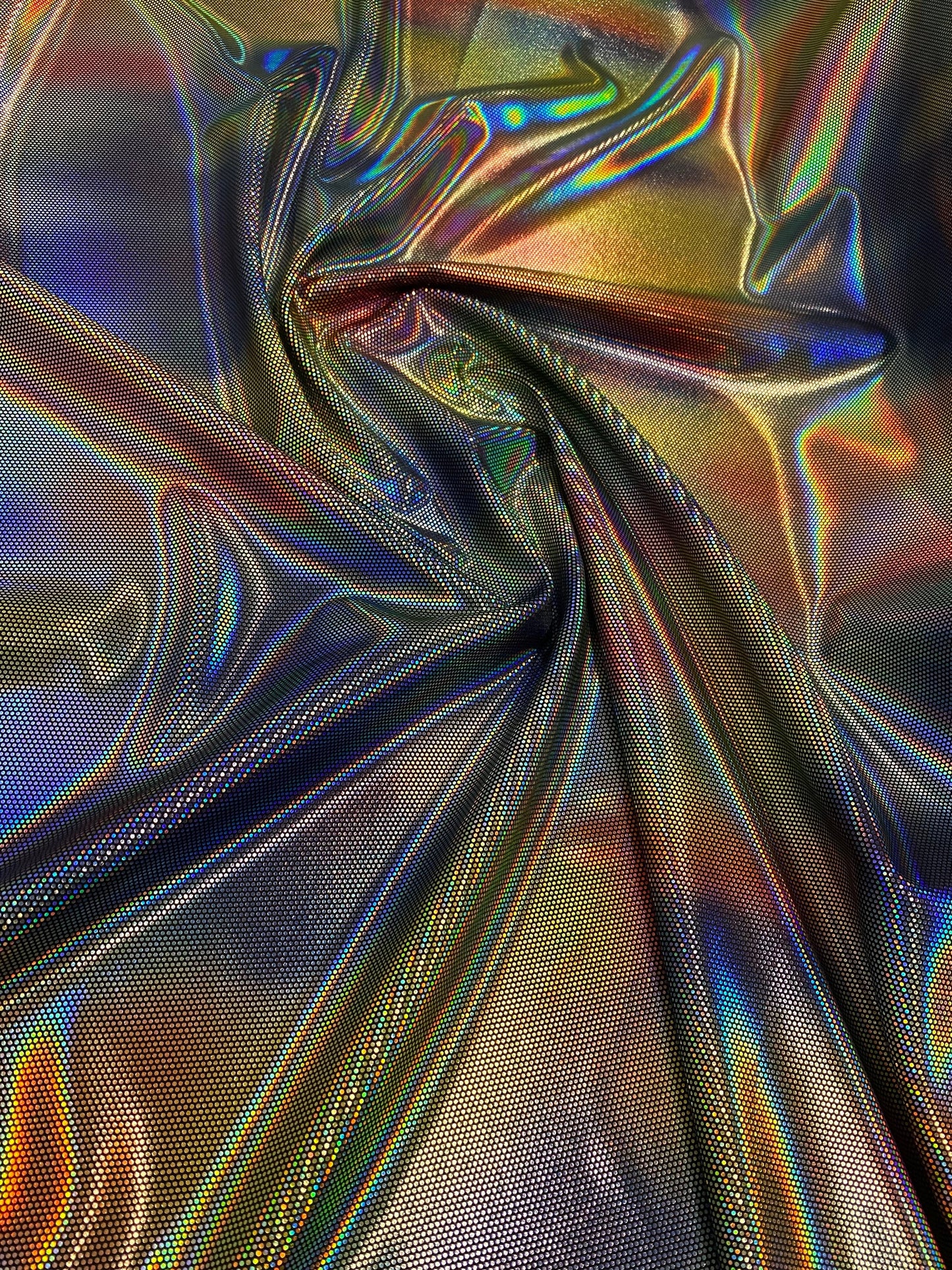 Luxury Spectrum iridescent hologram metallic foil on stretch velvet 58/60” 4-way stretch 58/60” Sold by the YD. Ships worldwide from L.A CA.