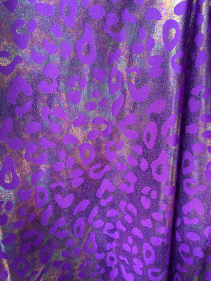 New exotic iridescent leopard design hologram nylon spandex 4-way stretch 58/60” Sold by the YD. Ships worldwide from Los Ángeles California