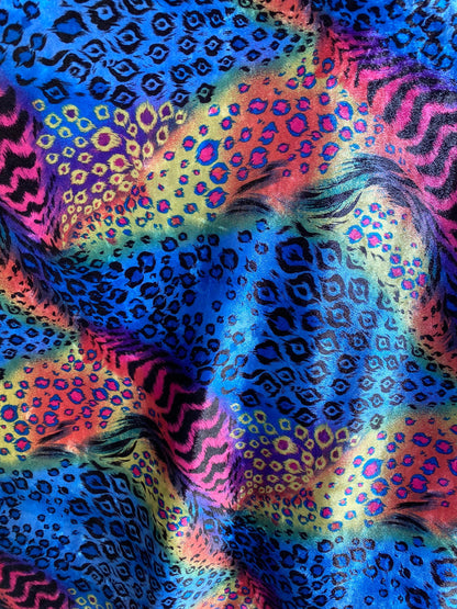 New Exotic multi animal print design multicolor print on stretch velvet 4way 58/60” Sold by the YD. Ships worldwide from Los Angeles CA USA.