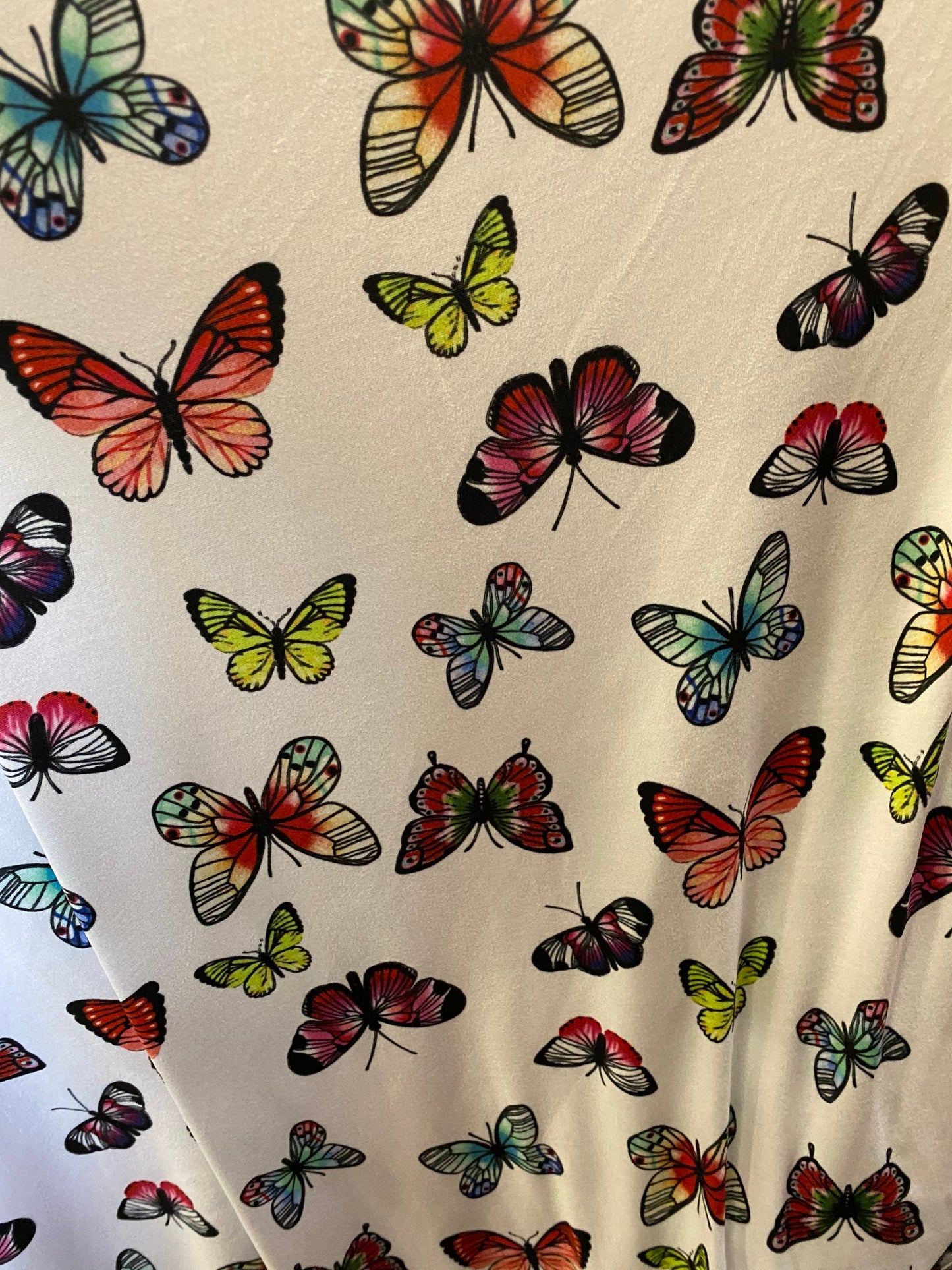 New butterflies design multicolor print on good quality stretch poly spandex 4-way stretch 58/60” Sold by the YD. Ships worldwide