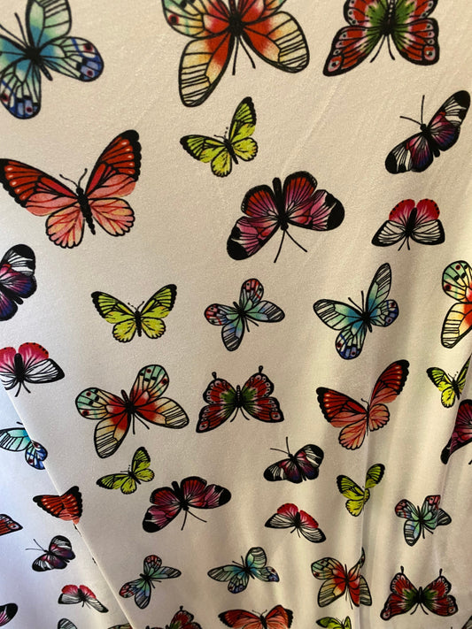 New butterflies design multicolor print on good quality stretch poly spandex 4-way stretch 58/60” Sold by the YD. Ships worldwide